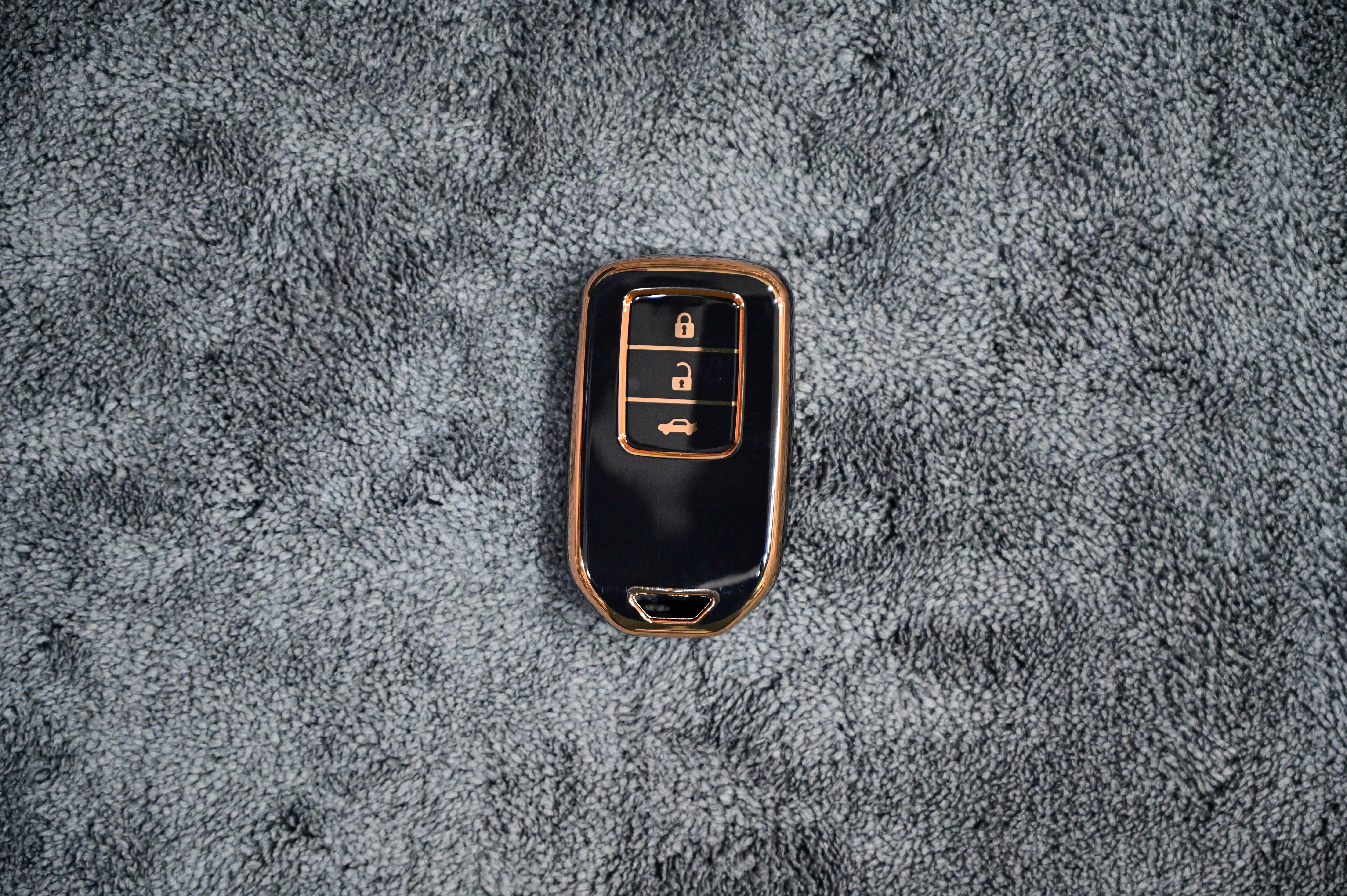 Premium TPU Smart Key Fob Cover (Glossy Black & Rose Gold Trim) - 3-Button Protection Case Main image